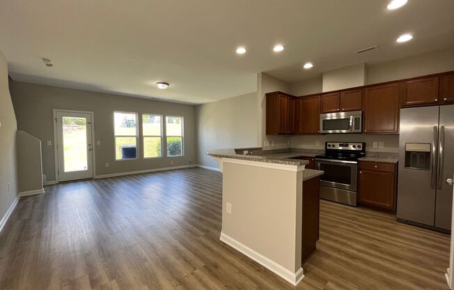 Corner Unit 3BD, 2.5BA Townhouse in North Raleigh with 1-Car Garage and Premier HOA Amenities