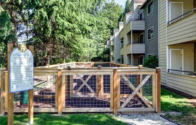 Pet Park with wooden fenced in boundaries at 2000 Lake Washington Apartments, Renton, 98056