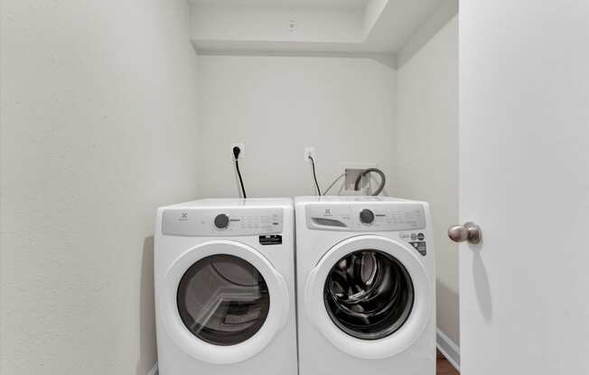 a washer and dryer in a laundry room