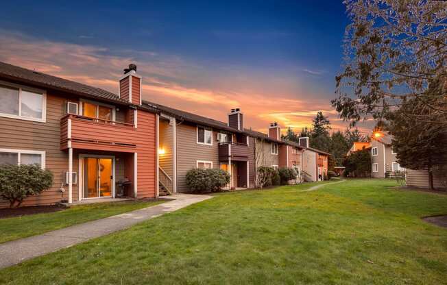 a row of houses on a city street at sunset at Quartz Creek, Washington, 98043