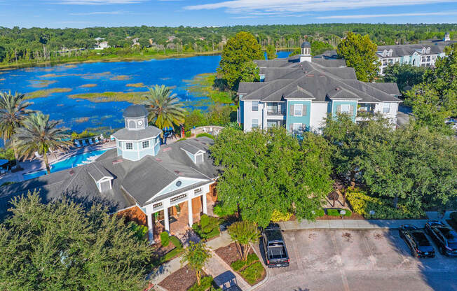 a aerial view of the resort with the lake in the background