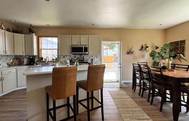 Occupied, do not disturb tenants. West Valley 3 br 2ba Dbl garage, LVP flooring and more!