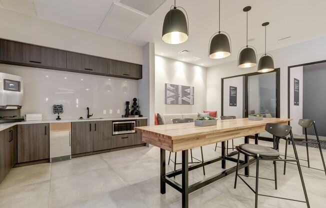 a kitchen and dining area in a 555 waverly unit