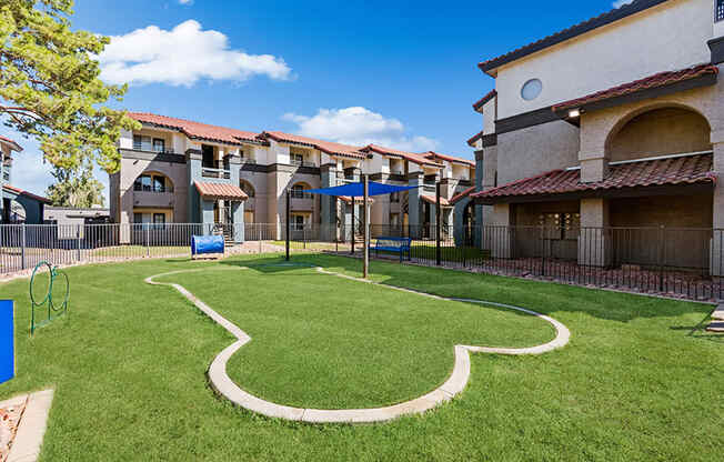 Community Dog Park with Agility Equipment at Stillwater Apartments in Glendale, AZ.