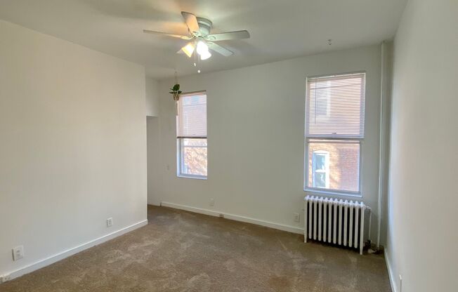 2504 N Calvert St – Your Timeless Urban Retreat!