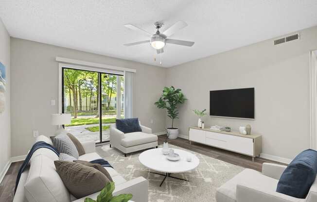 a living room with couches and a coffee table