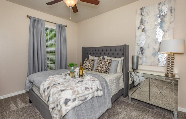 a bedroom with a bed in a room