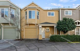 Spacious 2-Bedroom Townhouse with Dual Master Suites and Attached Garage!