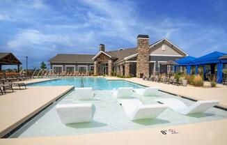 Pool Side Relaxing Area With Sundeck at Watermark at Harvest Junction, Longmont, CO, 80501