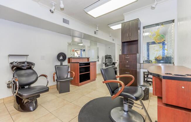 a kitchen with a stove top oven sitting inside of a room