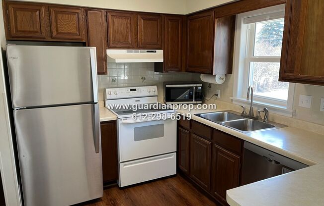 Shoreview House Available September 1st, Updated Full Bath, Updated Flooring, Large Fenced Yard, Oversized Garage