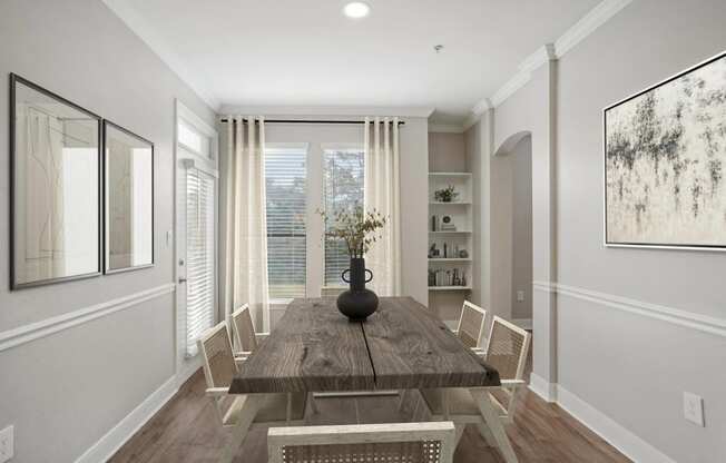 a dining room with a wooden table and chairs  at The Verandah, Texas, 78726