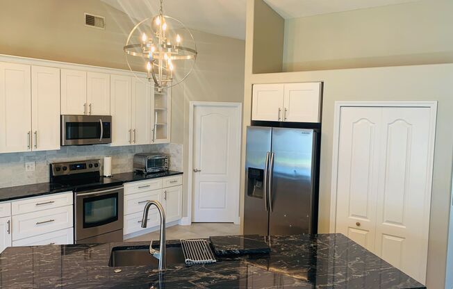 Lovely 4/2 in the Gated Lake Fisher Estates of Gotha!  Available Now!