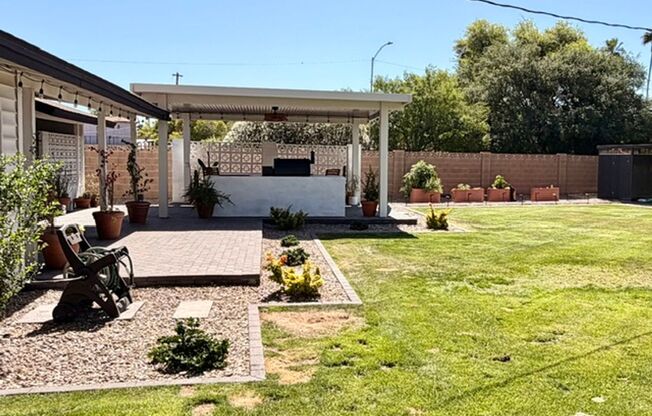 Updated Central Phoenix 3 bed, 2 bath with open layout, stainless steel appliances, and large irrigated backyard near Downtown and light rail.