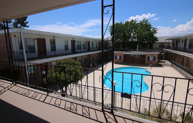 a view of the pool from the balcony