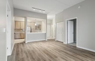 A spacious kitchen with a sink and a countertop.