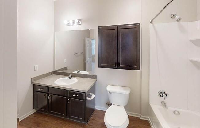 a bathroom with a sink toilet and a shower