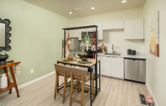 Dining Area and kitchen of One bedroom at Streamliner 16th Apartments in Phoenix Arizona