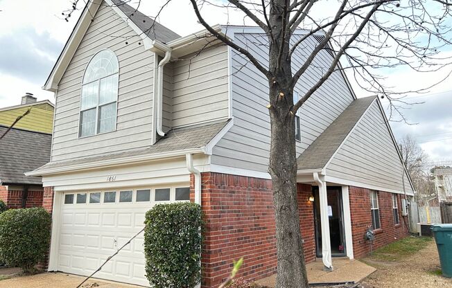 3BD/2.5BA Townhome with fully fenced back yard! Newer Paint! Newer Flooring!