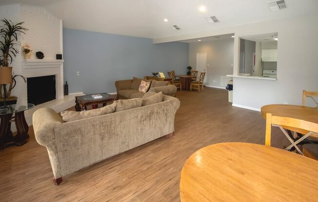 a living room with a couch and a table