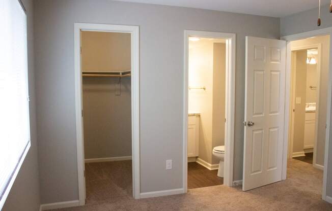 master bedroom with bathroom and nice size closet