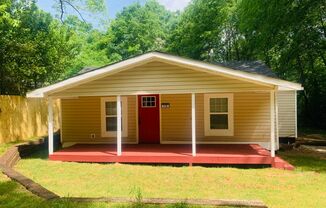 Will not last! 2 bed, 1 full bath, private setting, level lot, large front porch, newly renovated, tile baths, upgraded vanities!