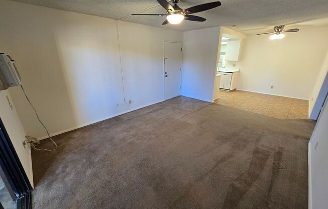 Move-In Special: 1/2 off 1st Month's Rent!!!  Freshly Painted 1-Bedroom Condo with Covered Parking