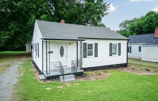 Renovated home with detached building/guest house