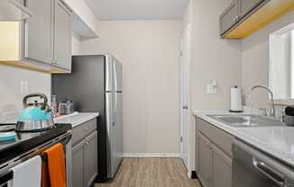 the preserve at ballantyne commons apartment kitchen with stainless steel appliances