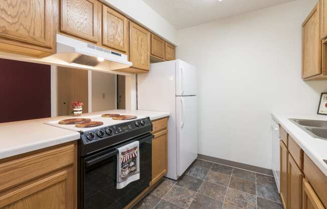 Bismarck, ND Bradbury Apartments. this is a photo of the kitchen in a 1 bedroom apartment