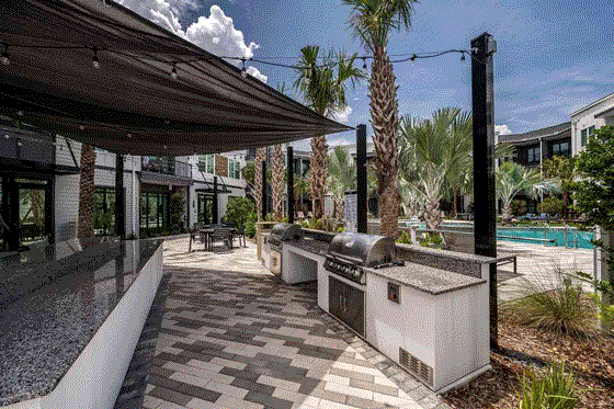 Outdoor grill and kitchen courtyard at The Citizen at Waterset in Apollo Beach, FL
