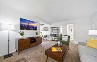 a living room with a couch and a coffee table