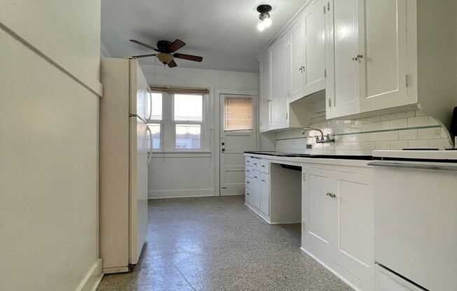 Buckman Charmer~ Quick Access to Big City Amenities~ Detached Garage Included~ Onsite Laundry~ Fur Babies Welcome!