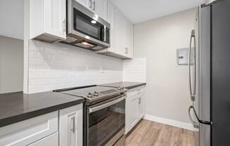 Kitchen With New Appliances at Los Robles Apartments, Pasadena, CA