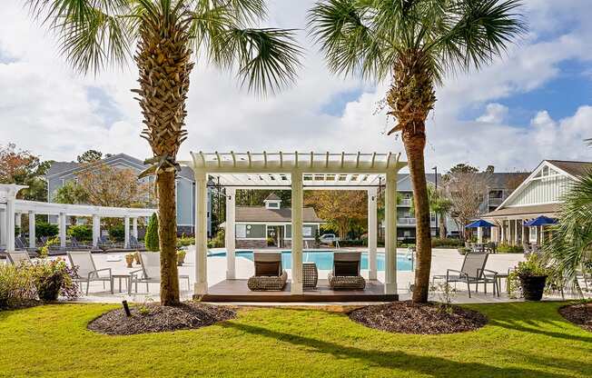 Pool with cabana seating at The Reserve at Mayfaire Apartments, Wilmington NC