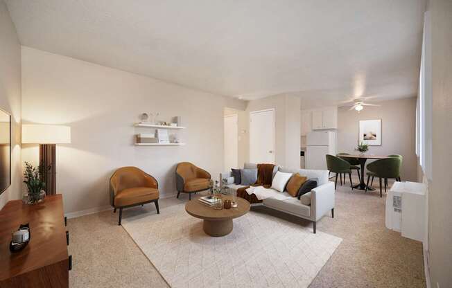 A living room with a couch, chairs, and a coffee table.