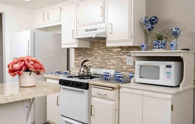 a kitchen with a sink and a refrigerator