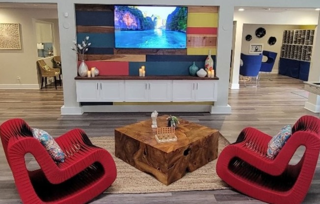 Fusion Orlando - TV Center with Red Chairs