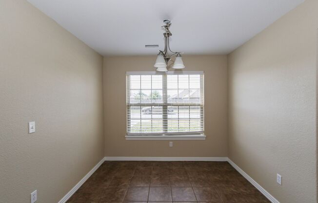 Here’s a more concise version of the description:  Spacious 4-Bedroom Home with Modern Upgrades