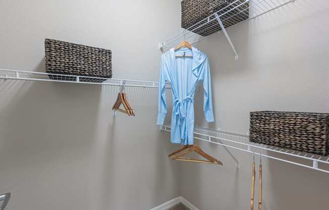 our spacious walk in closets are equipped with robes and hangers for your clothes