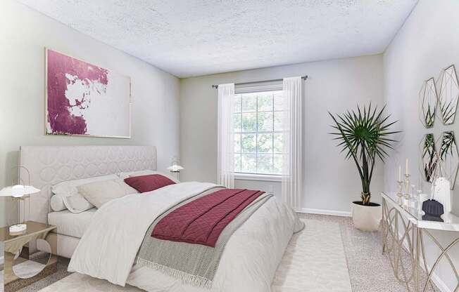 A bedroom with a large bed and a painting on the wall.