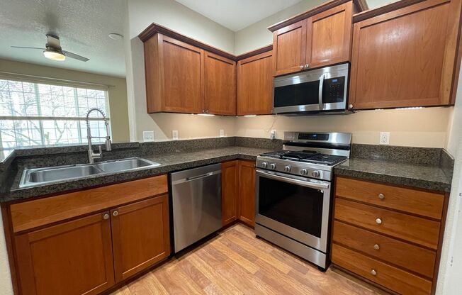 3Bd 3Ba Home in Hillsboro with Attached Garage, Washer & Dryer Included, and Stainless Steel Appliances.