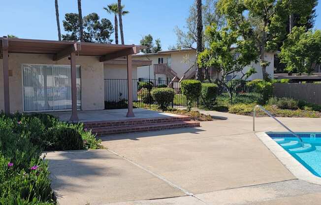 Club house next to swimming pool at Plaza Verde Apartments in Escondido, California.