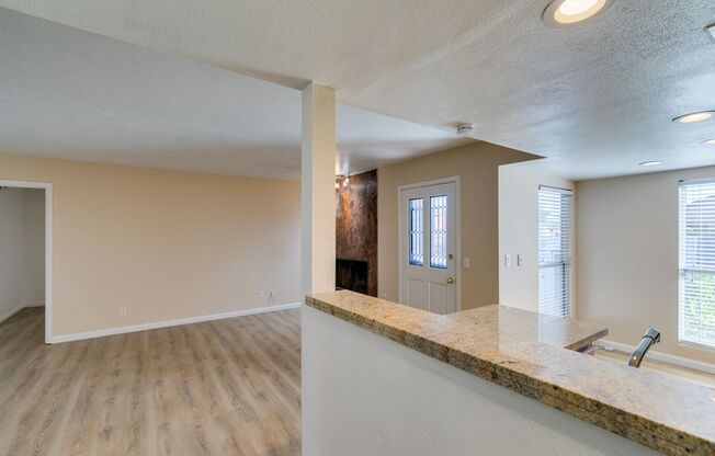 Modern 2-Bed Condo with Fireplace, Balcony & Designer Touches!