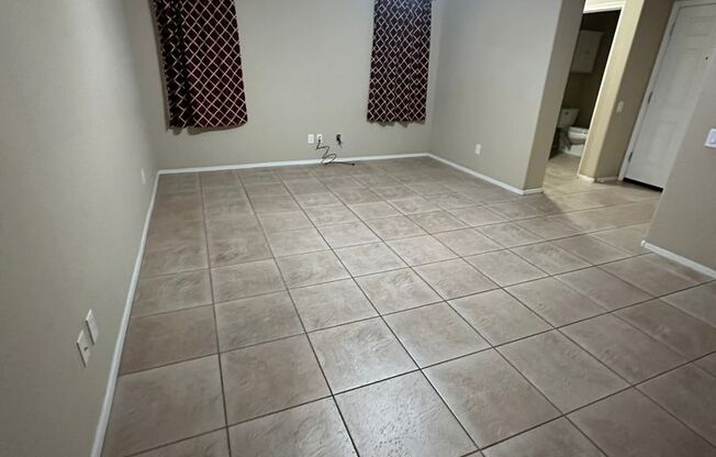 Charming 3 Bed + Den 2.5 Bath Home with 2 car attached EV garage with community pool !!