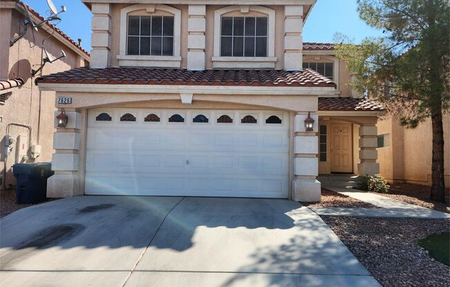 3-Bed, 2.5-Bath Pet-Friendly Home with Fenced Yard in Las Vegas