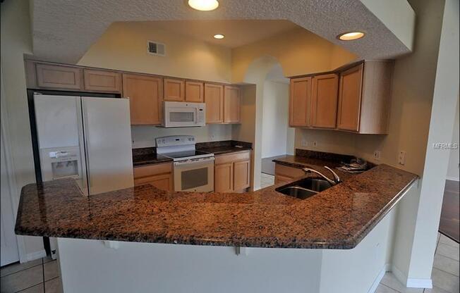 Lovely 4 bedrooms 2 and half baths Home in StoneyBrook Golf Community!