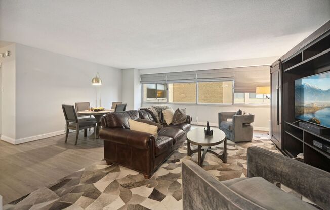Updated 1,000 Square Foot One Bedroom W/Parking Included- Roof Top, Pool, Front Desk, AMAZING LOCATION!