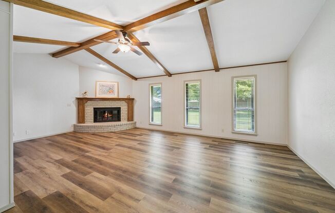 Spacious Single Story 4 Room Home + Sunroom on Nearly 1/2 Acre Lot!