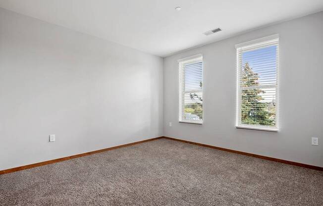 Bedroom with window view and ceiling light at 1910 on Water, Wisconsin, 53202